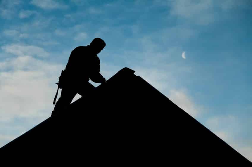 Picture of contractor working on a roof.